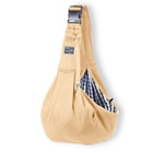 Beige dog holder sling for small dogs with adjustable safety buckle