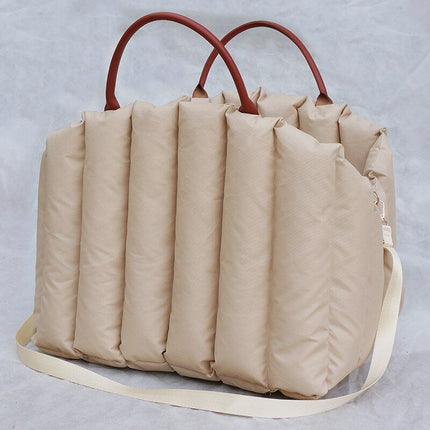 Beige portable dog carrier car seat with cozy padded comfort design