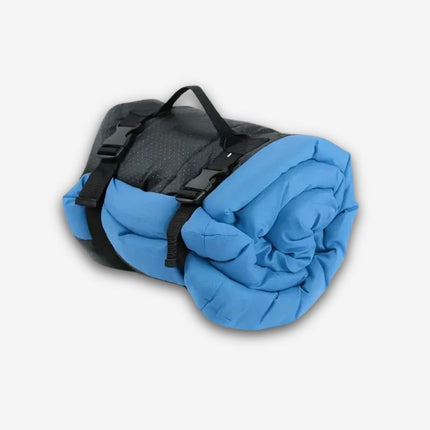 Blue portable dog bed with straps for hiking or road trips