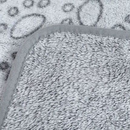 Close-up of fleece fabric on gray dog blanket
