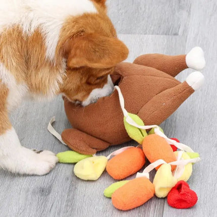 Dog playing tug with roast turkey snuffle toy