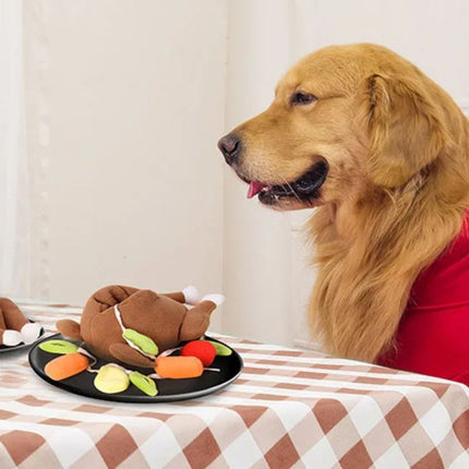 Golden retriever beside turkey shaped dog puzzle toy