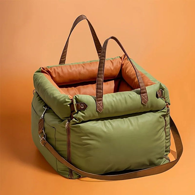 Green Dog Car Seat Carrier with Orange Interior and Safety Straps