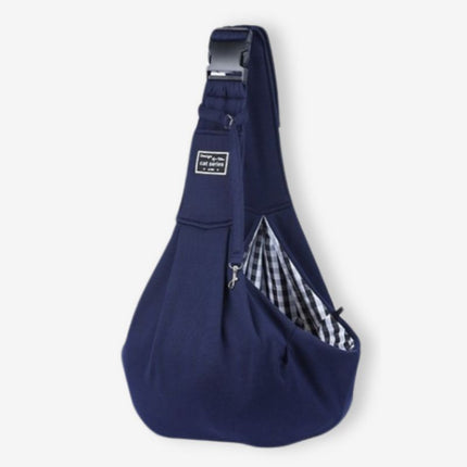 Navy blue dog sling carrier for small dogs with adjustable strap and safety buckle