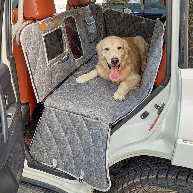 golden retriever enjoying comfort on back seat dog car cover