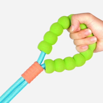 green bubblegrip dog leash handle held in hand